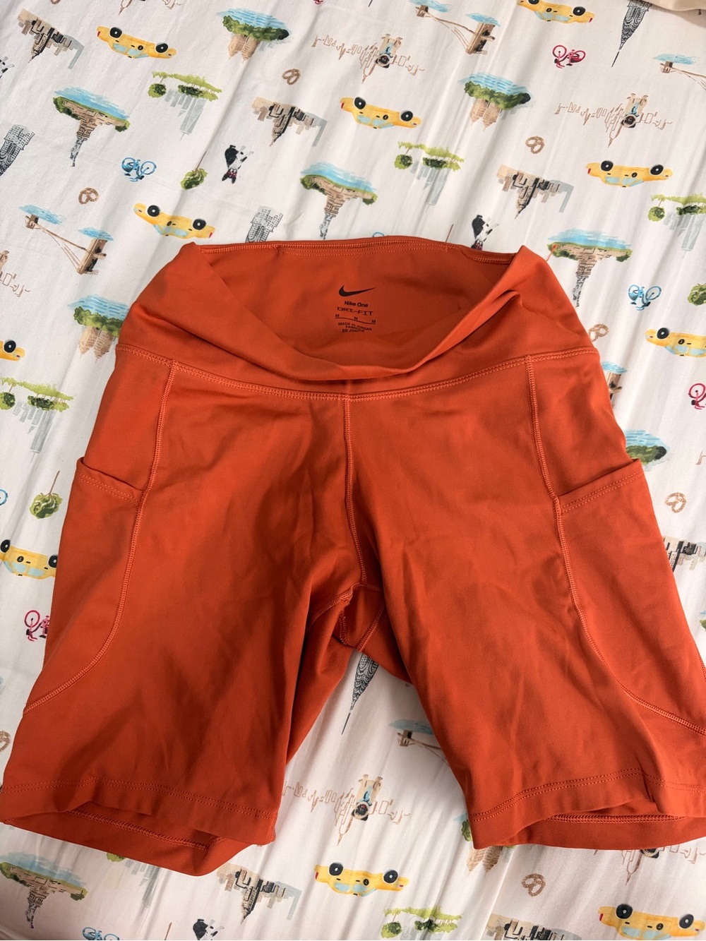 Nike Orange High-Rise Bike Shorts with Side Pockets